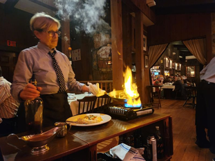 You Can’t Win on Food Alone: The Restaurant Theory of Law Firm Profitability