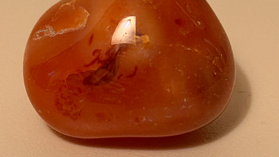 Carnelian tumbled stone for sacral chakra—supports emotional flow and creativity.