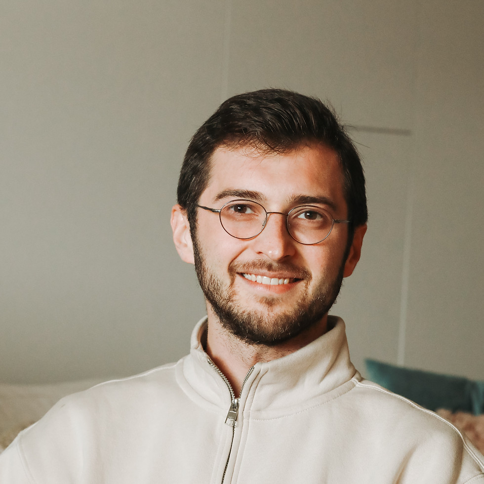 Smiling man with glasses and beard