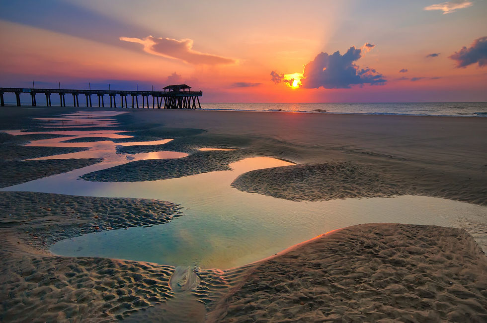 Tybee Island beach near Savannah with sandy shoreline and ocean views for an easy summer day trip from Red Gate Farms RV Resort