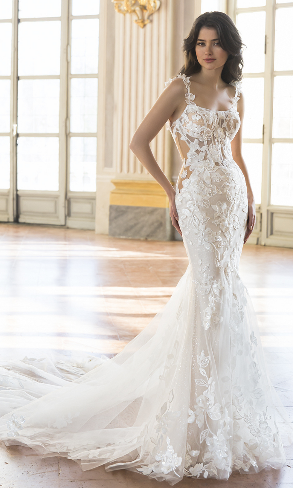 woman wearing a wedding dress with trail