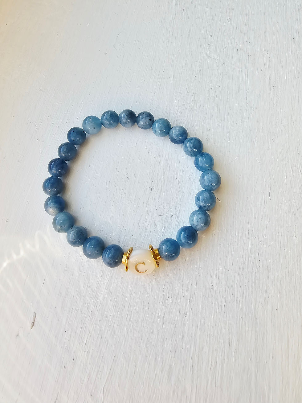Aquamarine bracelet with high-shine gold initial C