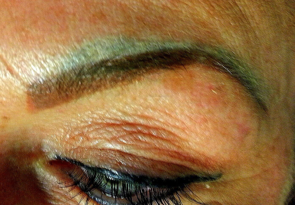 Example of an oversaturated eyebrow and camouflage