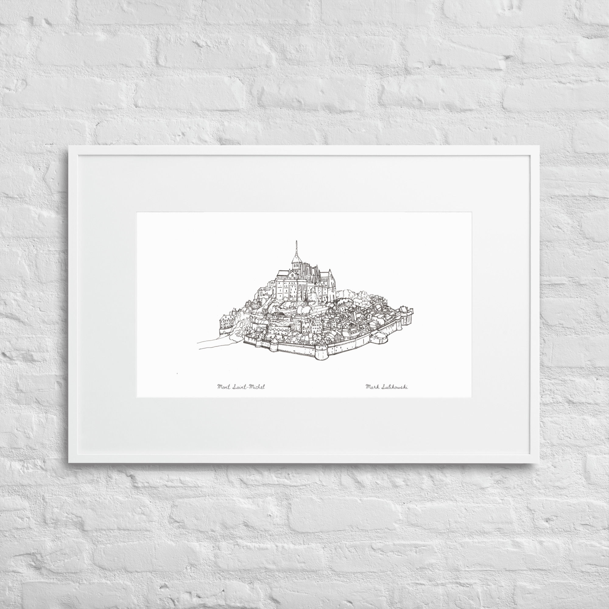 White framed Matt Print finish - Mont Saint-Michel is a meticulous hand drawn architectural illustration by Mark Sulikowski of the beautiful tidal island of Mont Saint-Michel, rendered in sharp black ink linework. Medieval complex rising like a pyramid from the Normandy coast, showcasing the formidable ramparts at the water's edge, densely packed village houses climbing the slopes, soaring Gothic abbey crowning the peak.