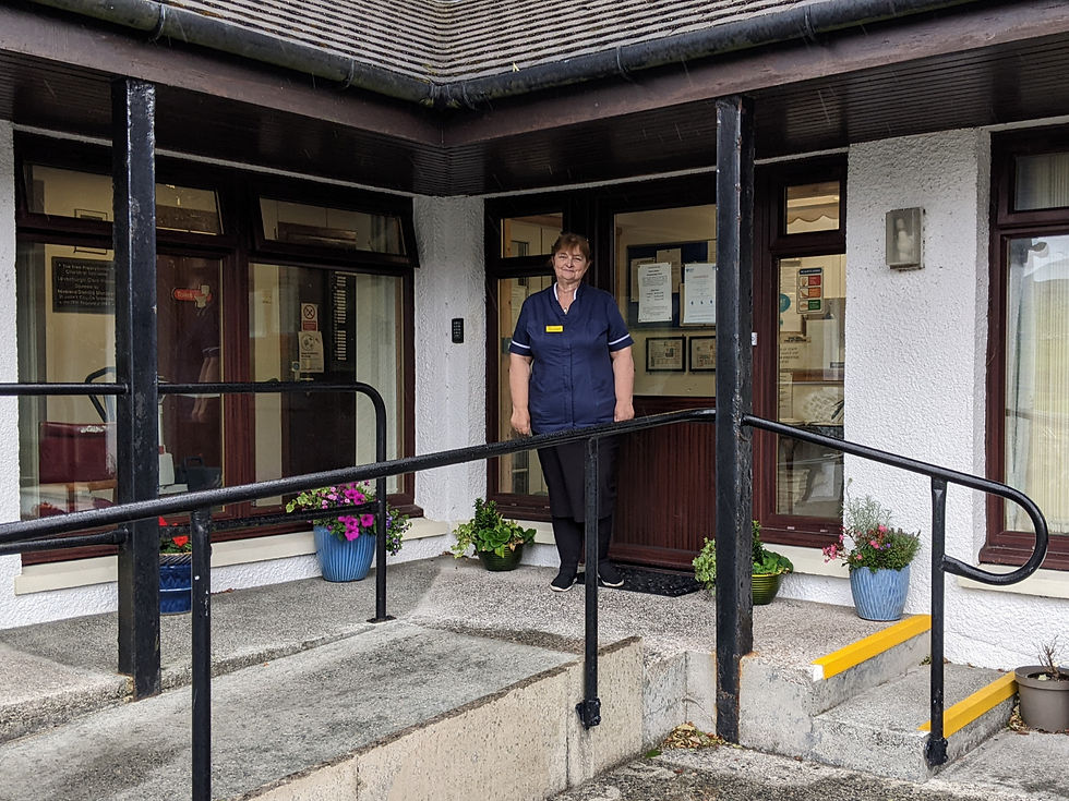 Isabel Campbell in front of the Leverburgh Care Home