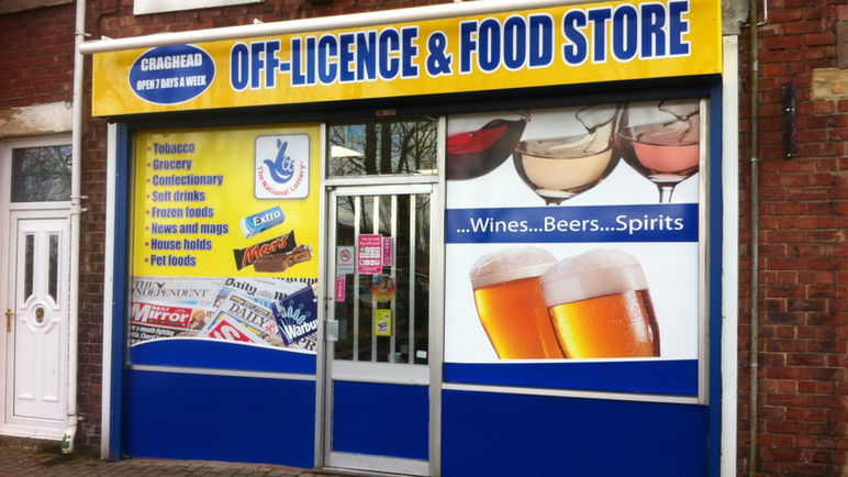 window graphics and illuminated trough lighting sign stanley.jpg