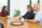 Roopal with clients.jpg