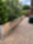 Driveway with sleeper wooden fence