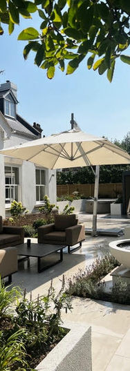 bowl shaped water feature with white shade umbrella