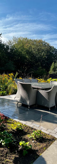 garden seat set surrounded by planting area