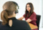 nurse speaking with a client