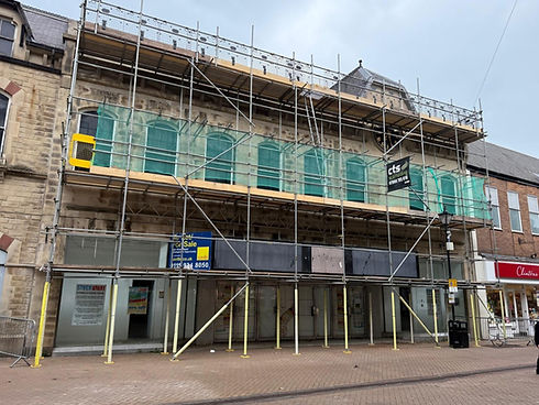 Commercial scaffolding structure with safety netting on building refurbishment