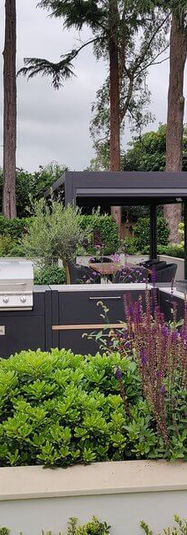 contemporary seating area with raised planters
