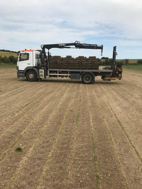 Medway picker in field with harvested turf