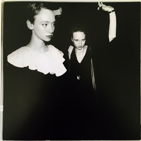 Two sisters in costume. Capra wears sterling silver jewelry of her own design.