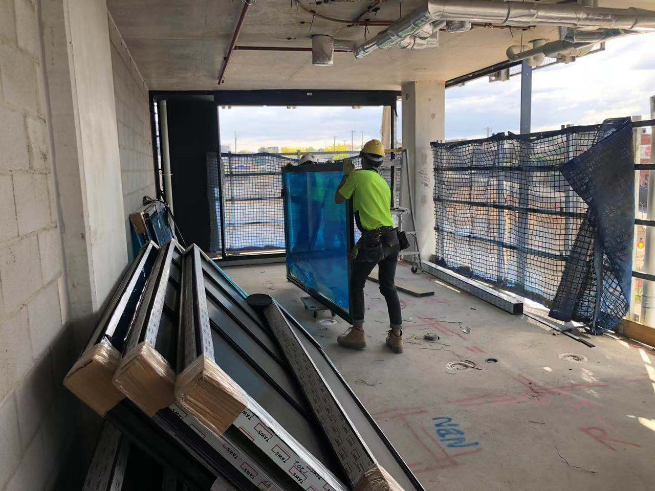 Carrying Glazing carefully on the worksite