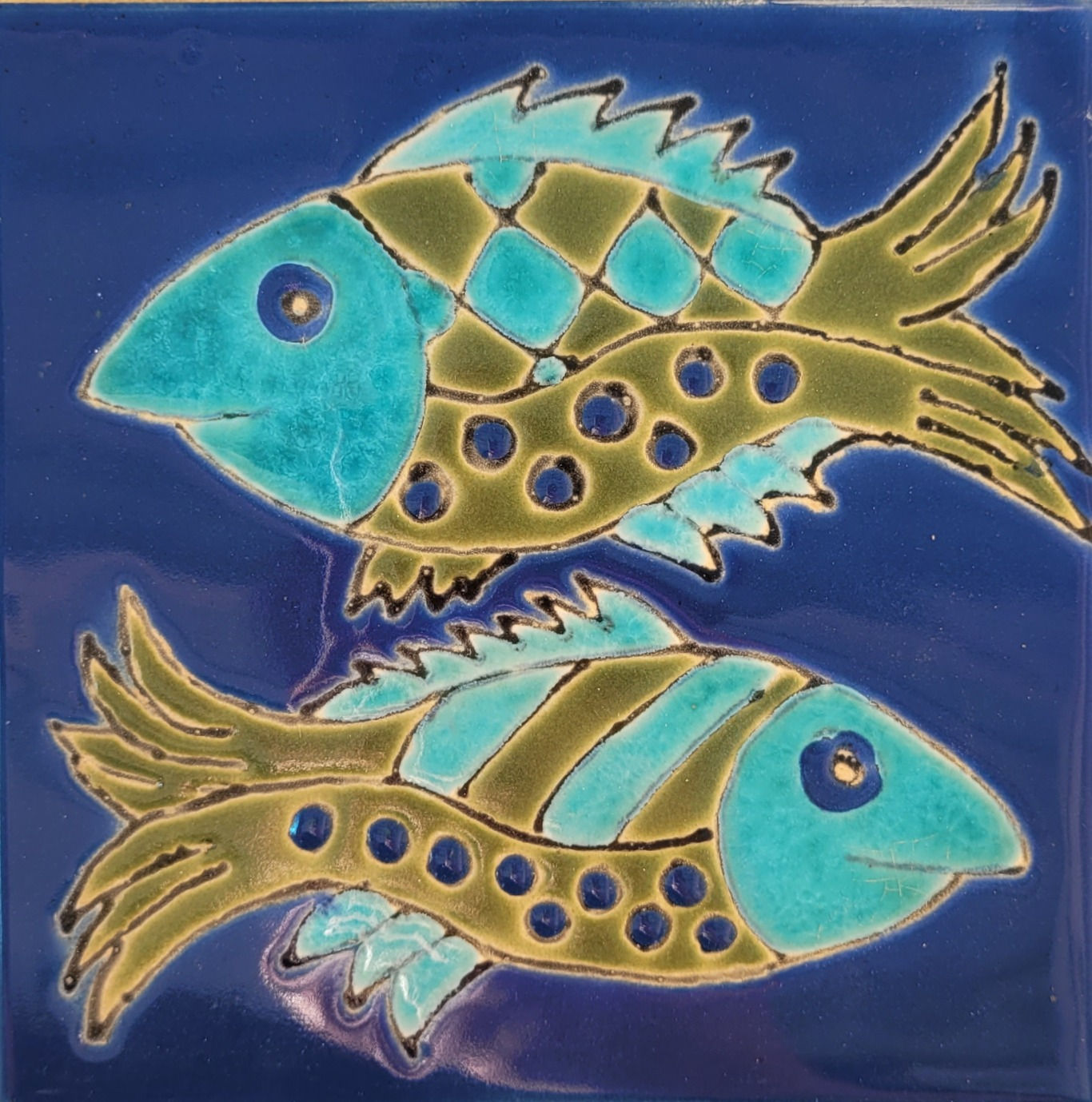 אריח דגים בים כחול