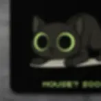 Close-up of Hunting Mode Kitty Mousepad with black cat, neon green eyes and the text “Mouse? Soon.”
