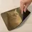 Thumbnail: Back view of rectangular cat mousepad with black natural rubber non-slip backing