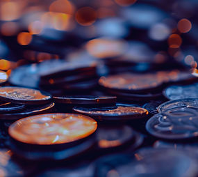 vecteezy_ai-generated-close-up-image-of-a-pile-of-coins-investment_37044405_edited.jpg