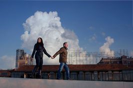 Couple walking in front of Ghirardelli Chocolate Factory, San Francisco