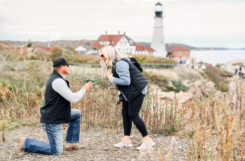 Surprise proposal at Portland Head Light at Fort Williams, Cape Elizabeth Maine