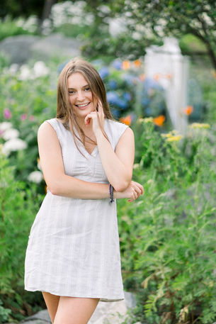 Tallulah in flower garden 5th Maine Peaks Island
