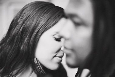 black and white couple passing one another