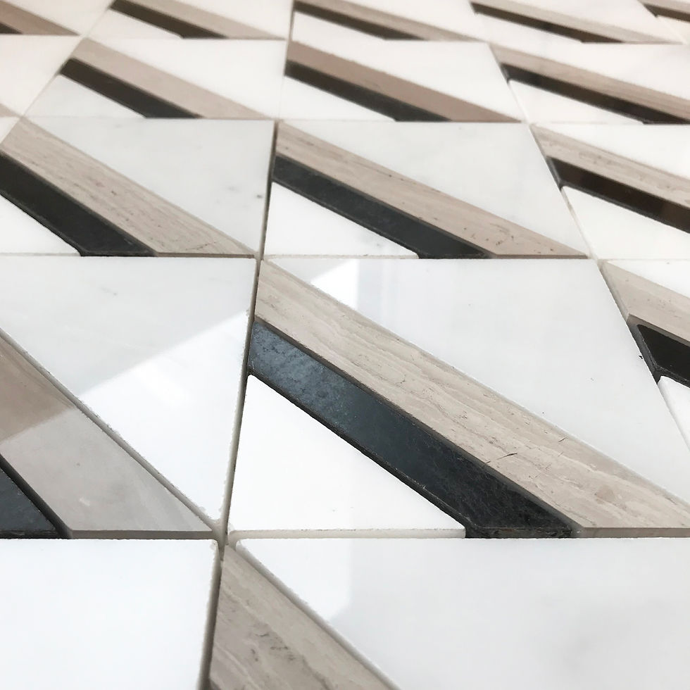 Thumbnail: A contrasting, contemporary geometric triangle pattern created by using different marbles in white, black & taupe