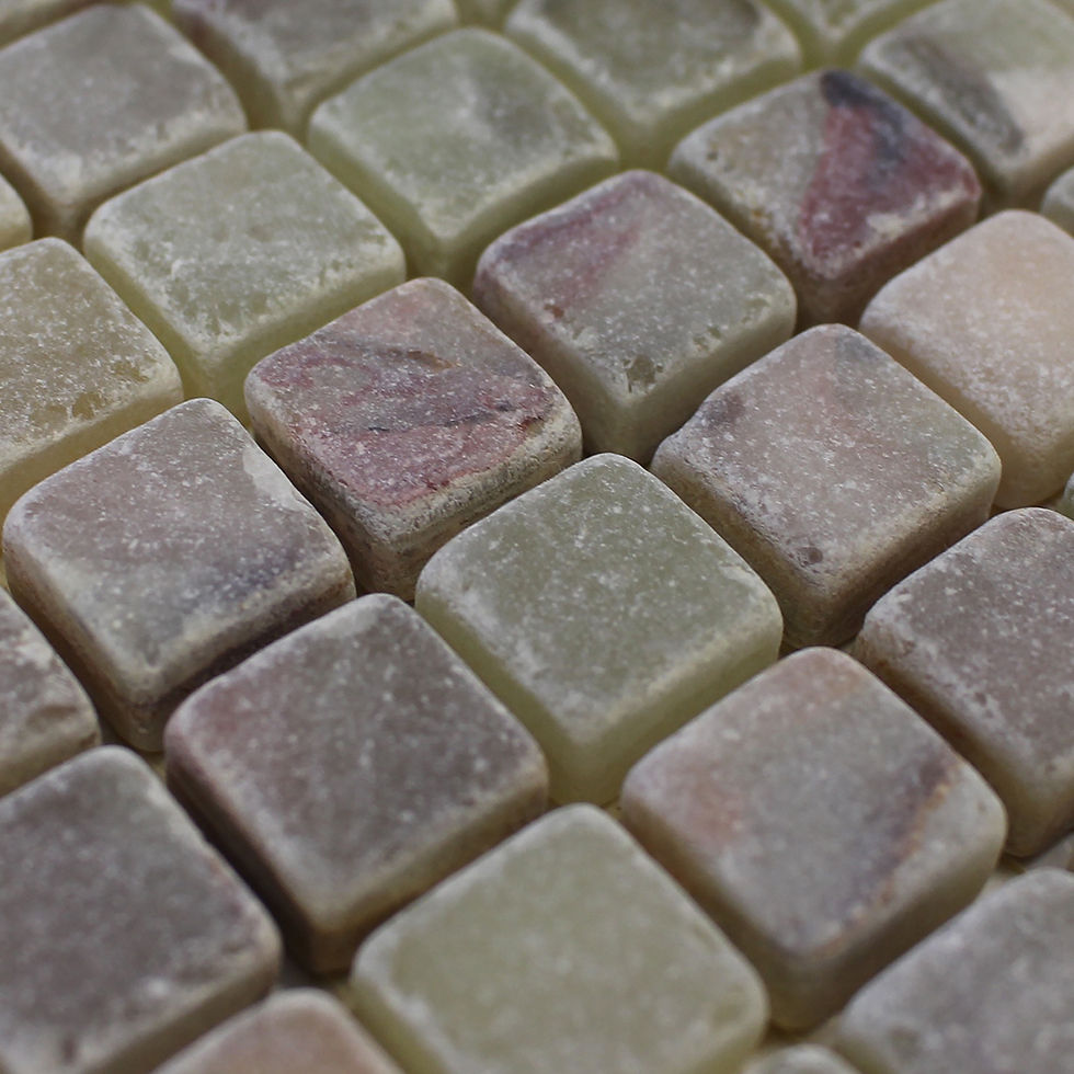 Use dark green onyx tumbled mosaics on your bathroom floors and bathroom wall for a touch of exotic