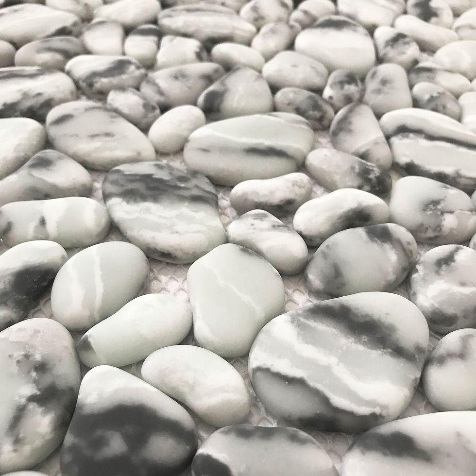 Thumbnail: reminiscent of a riverbed this enamel mosaic tile is organic, unique and adds flare to  your design