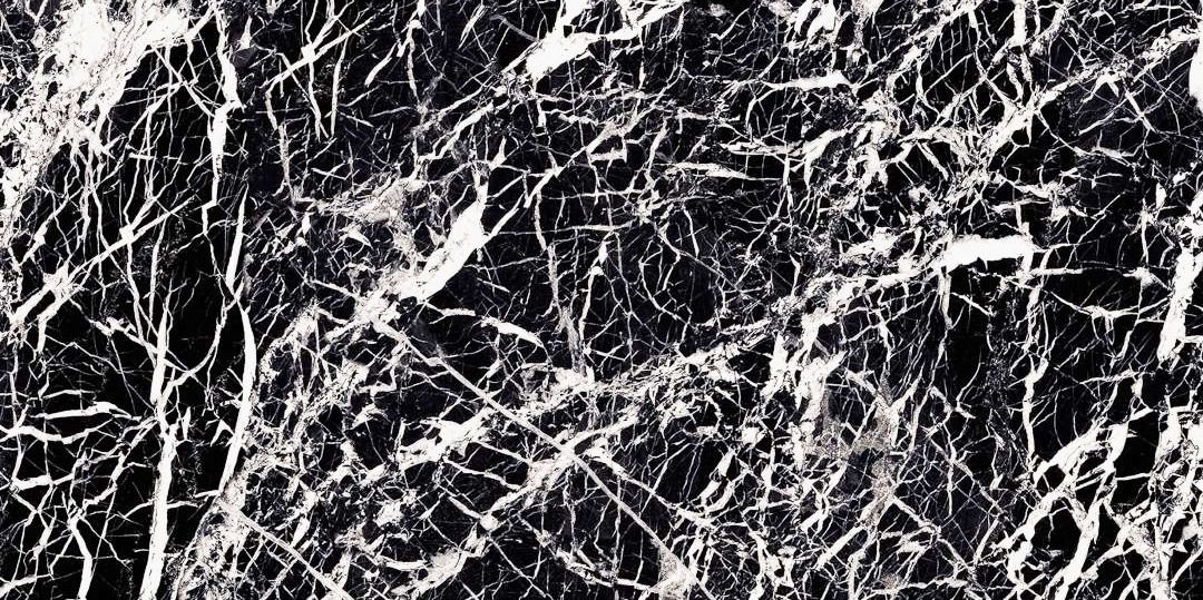Valentino Marble Glamour Black is a big porcelain tile with a black background and dramatic white veins