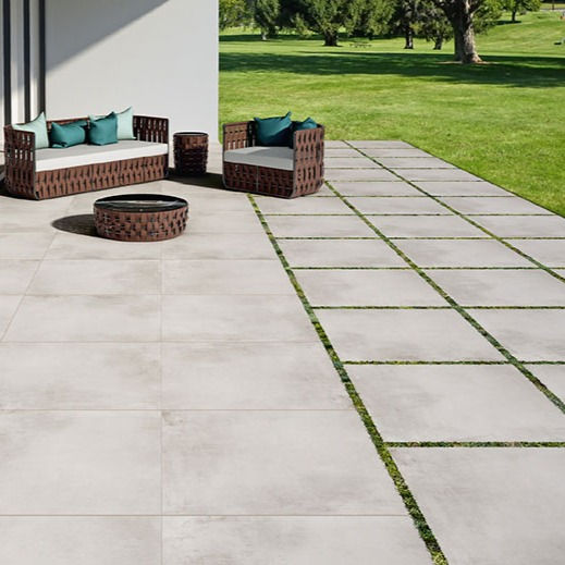 Cement Albus seen here in an outdoor backyard. Made in a 2cm thickness so it can withstand the outdoors