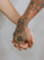 two people holding hands