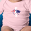 Thumbnail: Pink Parkview Christian School Onesie with Patriots logo on the front.