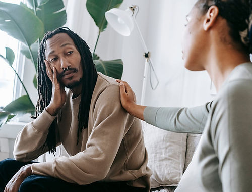 Woman comforting a Man