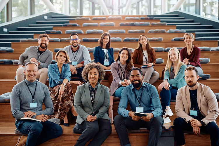 multiracial-group-of-happy-business-seminar-attend-2023-11-27-05-04-14-utc.jpg