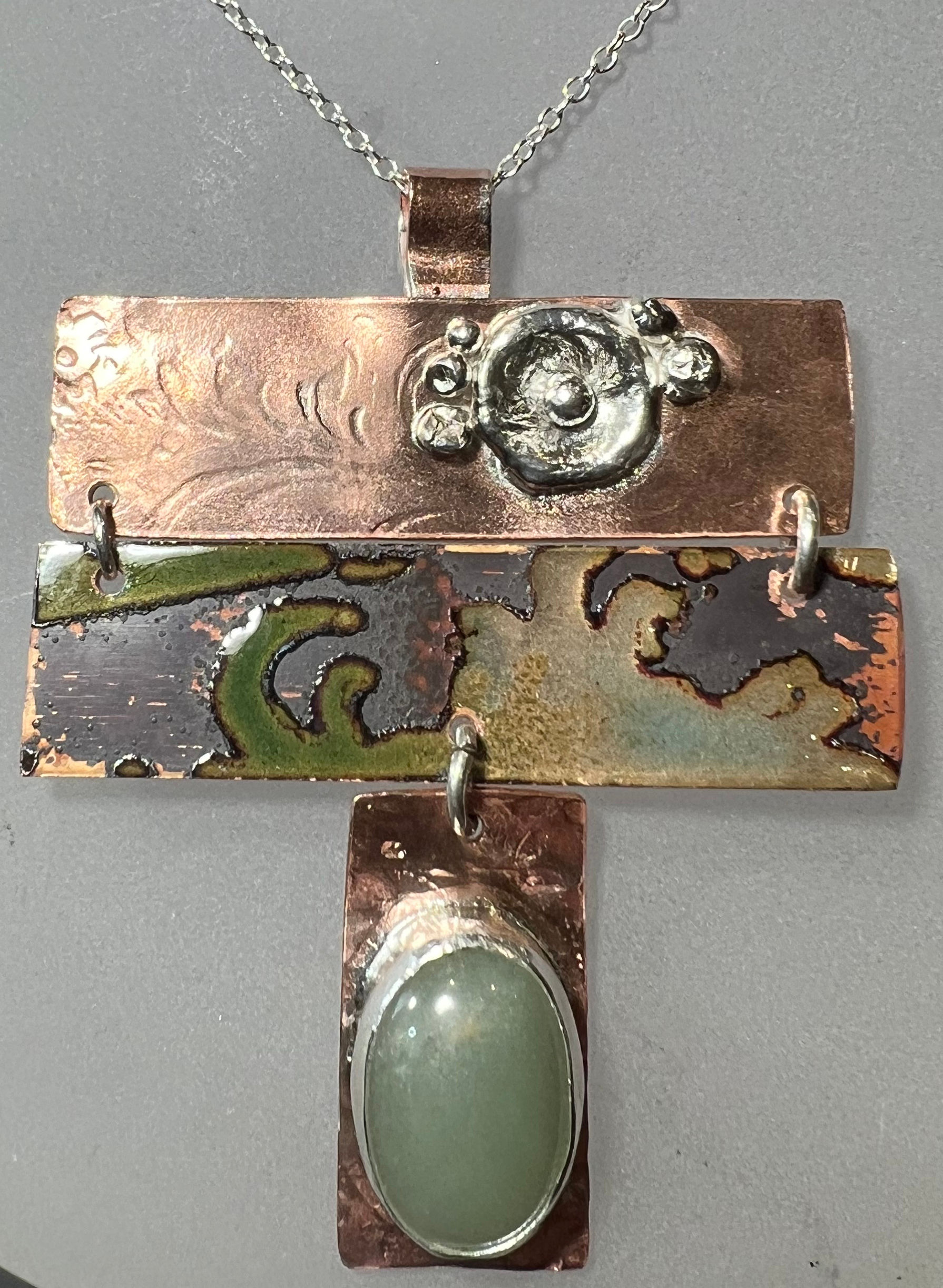 Copper and Enamel Pendant with a Bezel set Aventurine