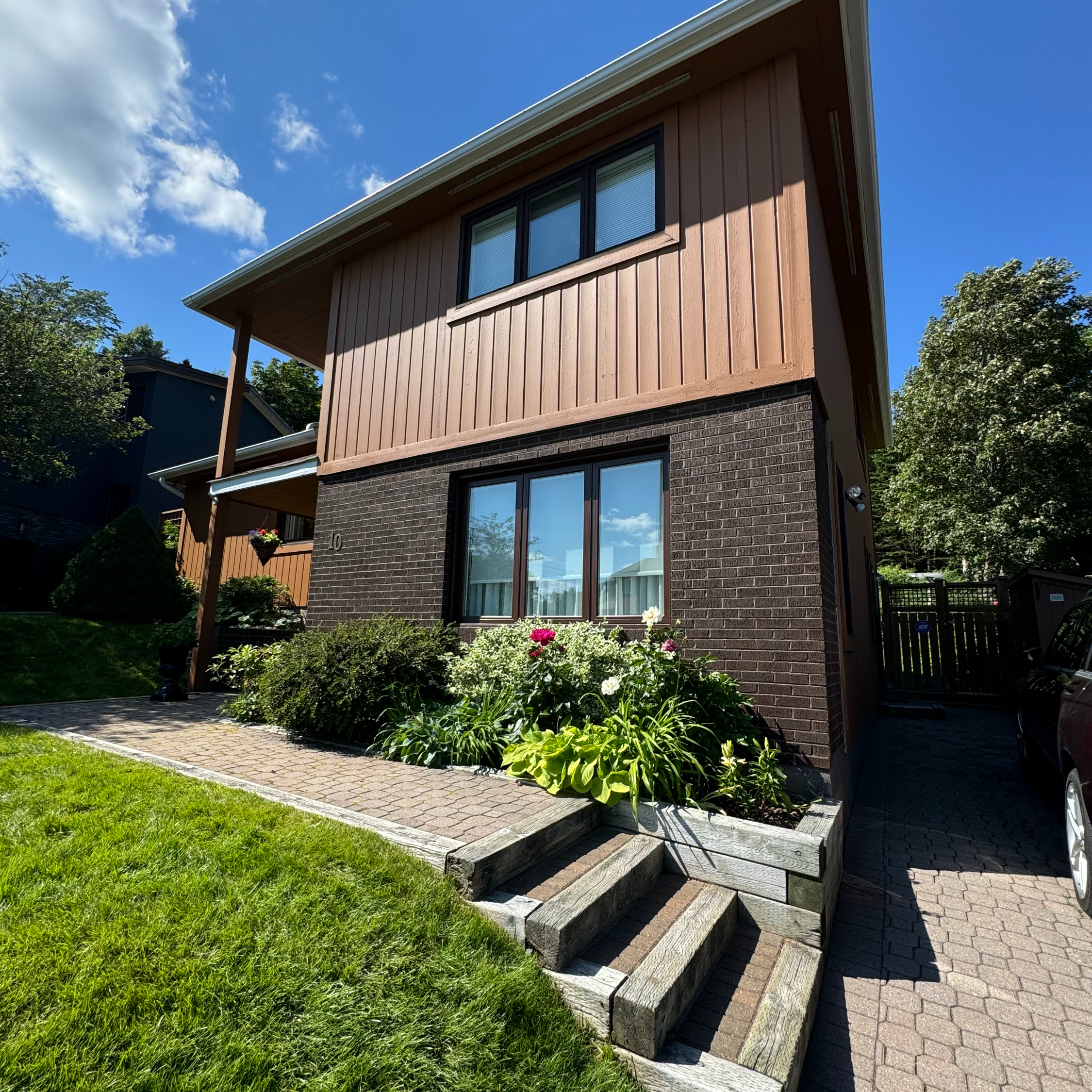 Exterior full home green shrubs