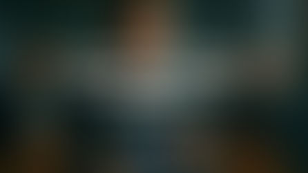 Serious man in glasses at a table, flanked by three blurred figures. Text: "The Intellectual Bully: When Arrogance Masquerades as Intelligence."