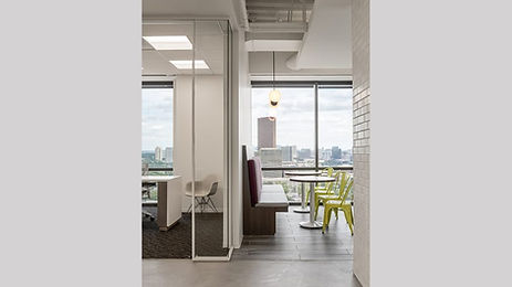 Private Offices utilize glass fronts to pour light into the interior of the space.