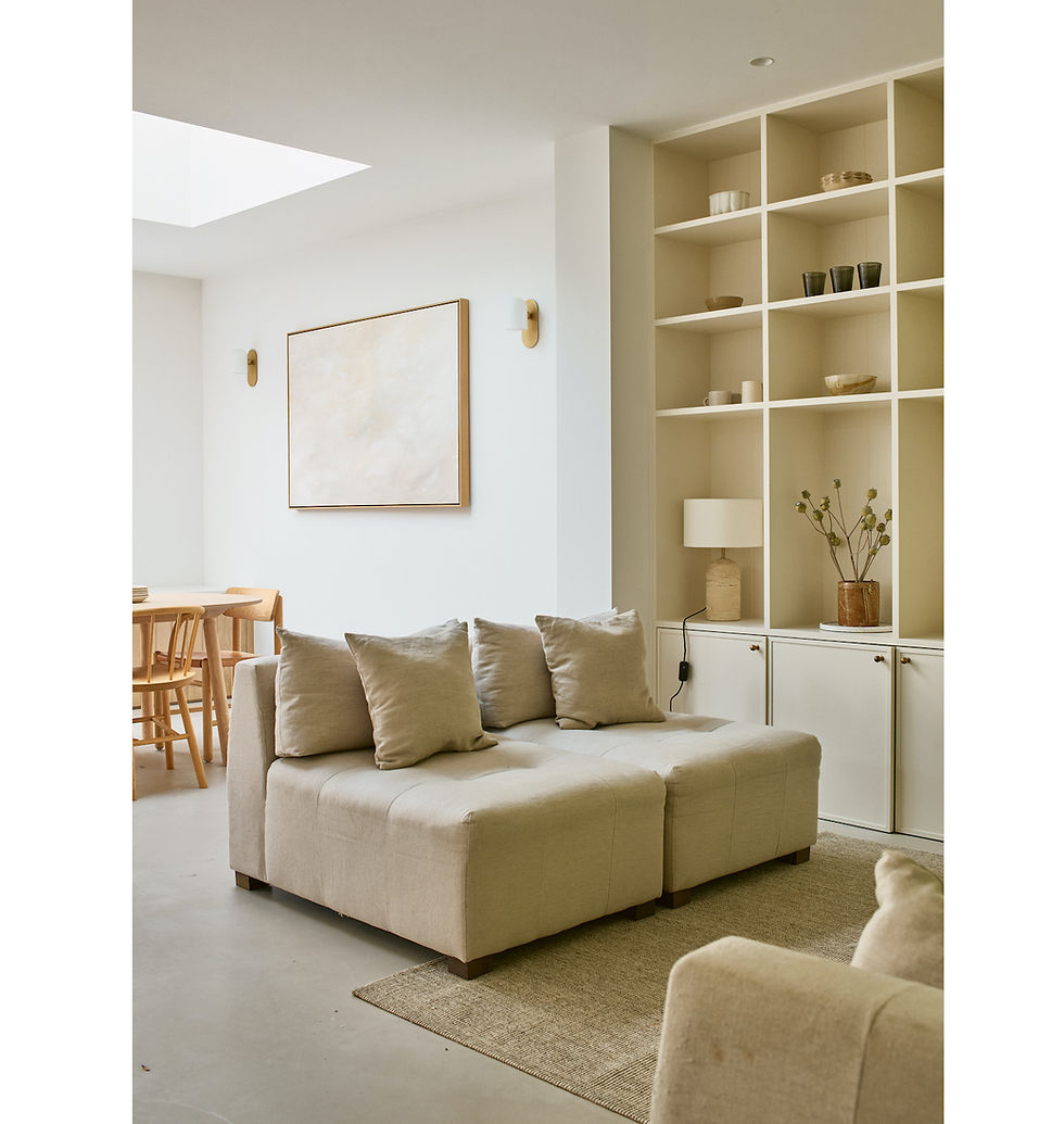 Shelving, seating and flooring in similar colour tones keep this colour palette smooth and harmonious (Benjamin Edwards/PA)