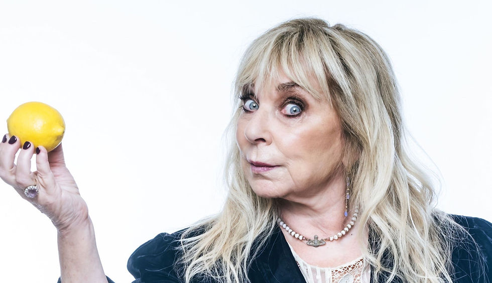 Comedian Helen Lederer holding a lemon