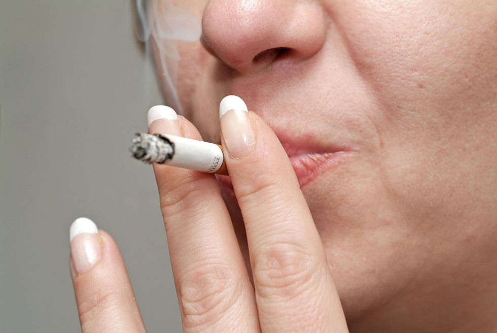 Close-up picture of a woman smoking a cigarette