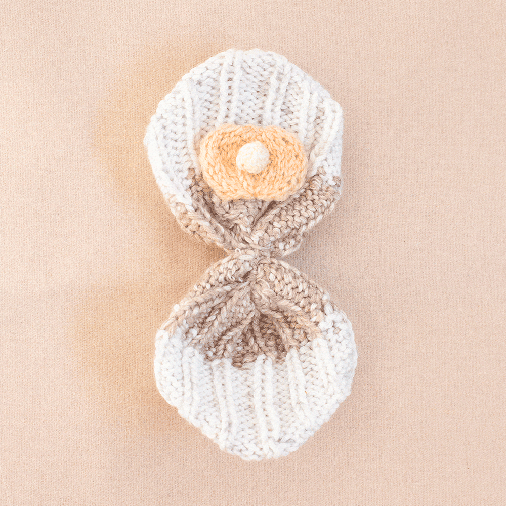 Knitted Shell with a Pearl Pattern