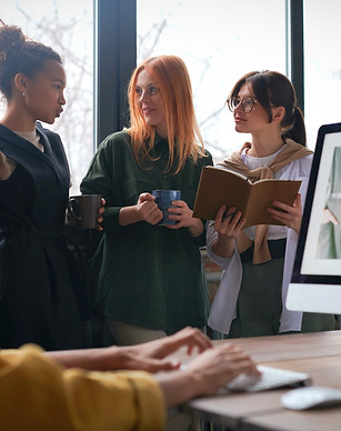 photo-of-women-talking-to-each-other-318