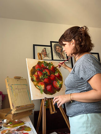 Rita working on oil painting