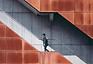 Man Walking Up Stairs