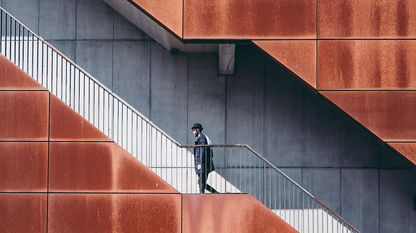Man Walking Up Stairs