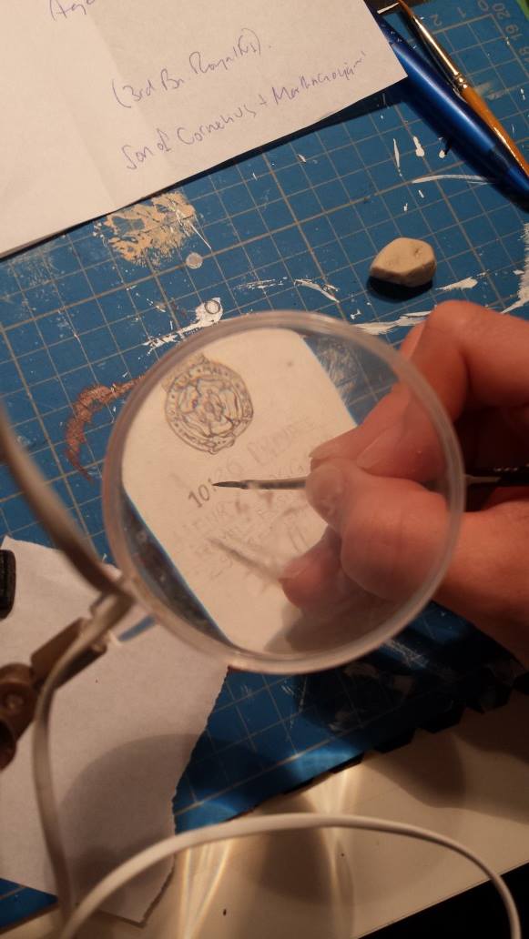 Inking the headstone details